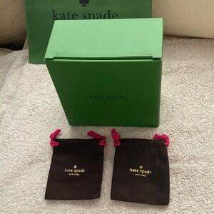 NWT- Kate Spade box, two Kate Spade, dust bags, and one Kate Spade shopping bag.